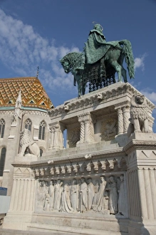 Hungary, Budapest, Castle Hill, Fishermans Bastion. Statue of King Stephen in front of St