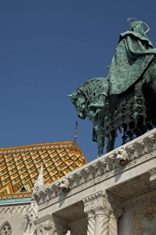 Hungary, Budapest, Castle Hill, Fishermans Bastion. Statue of King Stephen in front of St