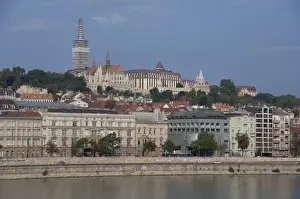 Hungary, Budapest. Early morning view from Pest across the Danube River to Castle Hill area of Buda