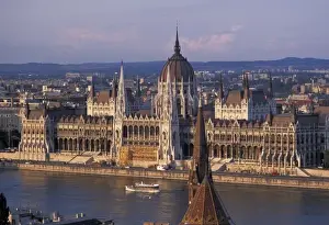 Hungary, Budapest. Parliament house and Calvinist Church on the Danube River