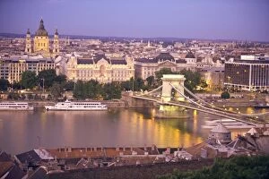 HUNGARY, Budapest. View of the Szechenyi Chain Bridge and St. Stephens Basilica