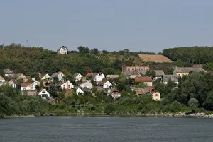Images Dated 12th September 2009: Hungary. Danube River view near Kalocsa. Typical homes and small vineyard