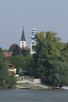 Images Dated 12th September 2009: Hungary. Danube River view near Kalocsa. Typical waterfront village with clock tower