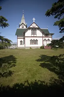 Images Dated 12th July 2009: Husavik, Icelands cross-shaped church over looking the harbor is the port citys landmark