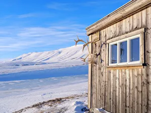 Reindeer Prints: Huts called Semmelbu. Valley Semmeldalen during winter