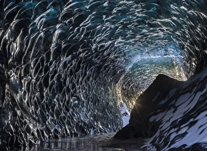 Ice cave at the northern shore of glacial lagoon Jokulsarlon in glacier