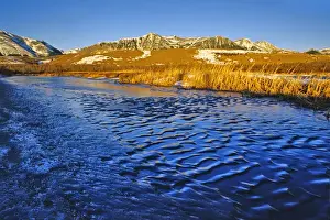 Waterton Prints: Ice Ripples on pond in Waterton Lakes National Park in Alberta Canada