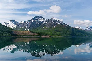 Waterscape Prints: Ice streaked mountains reflect on Holandsfjorden near Svartisen glacier