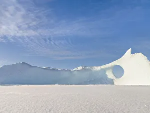 Greenland Collection: Iceberg frozen into the sea ice of the Uummannaq fjord system during winter