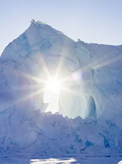 Greenland Prints: Iceberg frozen into the sea ice of the Uummannaq fjord system during winter