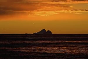 iceberg silhouette at sunset, off the western Antarctic peninsula, Antarctica, Southern