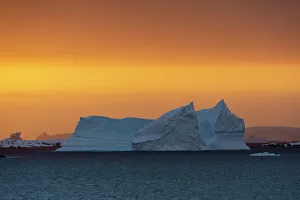 Floating Prints: An iceberg at sunset in the Lemaire channel, Antarctica
