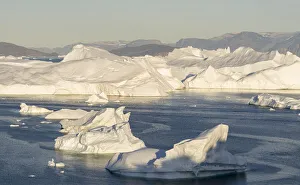 Images Dated 19th September 2019: Iceberg in the Uummannaq Fjord System. Glaciated Nuussuaq peninsula in the background