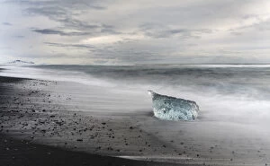 Iceland Gallery: icebergs on black volcanic beach. Beach of the north atlantic near the glacial lagoon Joekulsarlon