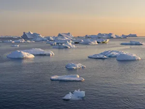 Midnight Sun Prints: Icebergs in the Disko Bay. Inuit village Oqaatsut (once called Rodebay) located in Greenland