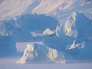 Images Dated 28th January 2020: Icebergs frozen into the sea ice of the Uummannaq Fjord System during winter