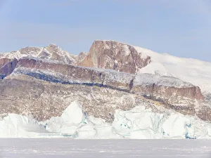 Greenland Prints: Icebergs frozen into the sea ice of the Uummannaq fjord system during winter