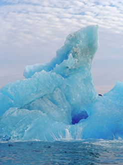 Icebergs northeast of Isertoq near Tasiilaq close to Sermilik (Sermiligaaq) Icefjord in the Ammassalik area in northeast of Greenland, Danish Territory