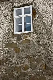 Concrete Prints: Iceland, Akureyri. Close-up of window of an old stone house