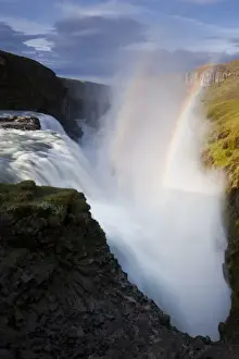Gullfoss Prints: Iceland, Arnessysla County, Rainbow forms as Hvita River pours over Gullfoss waterfall