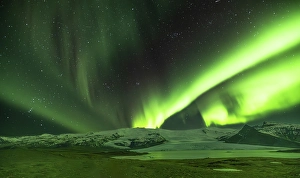 Images Dated 16th January 2024: Iceland, Aurora Borealis near Fjallsarlon