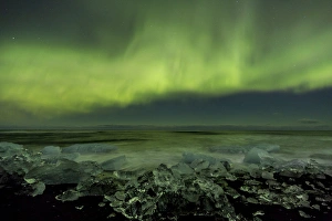 Jokulsarlon Prints: Iceland, Jokulsarlon. Aurora borealis and ocean shore