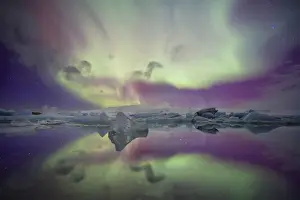 Images Dated 13th November 2012: Iceland, Jokulsarlon. Aurora lights reflect in lagoon