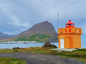 Settlement Prints: Iceland. Lighthouse Osholar, Bolungarvik at fjord Isafjardardjup during autumn