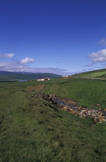 Images Dated 16th April 2004: Iceland, North Central Iceland Heidarbraut Farm with colorful mountains and river