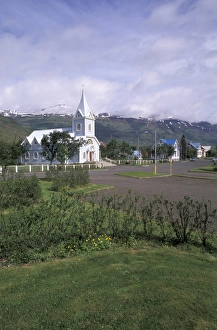 Images Dated 16th April 2004: Iceland, Seydisfjordur Blue church in town harbor; fishing port