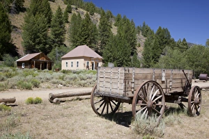 Images Dated 28th July 2011: ID, Custer, (1880s gold mining town) Freight wagon; with schoolhouse / museum