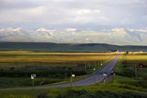 Images Dated 10th July 2005: Idaho Highway 33 in Teton County with Teton Mountains near sunset looking east