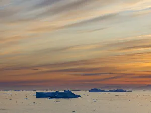 Ilulissat Icefjord also called kangia or Ilulissat Kangerlua, sunset over Disko Bay