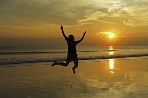 Anthony Asael Prints: India, Andaman Islands, Havelock, beach number 7, shadow of man jumping at sunset