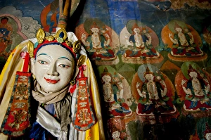 Mural Prints: India, Jammu & Kashmir, Ladakh, a religious statue in front of a mural of repetitive