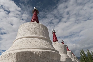 Images Dated 26th June 2012: India, Jammu & Kashmir, Ladakh, Leh, chortons against a blue sky with puffy white