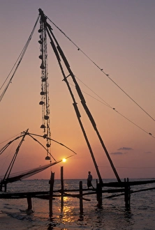 Labor Prints: India, Kerala, Cochin, Kochi Port on west coast, sunset at Chinese Fishing Nets