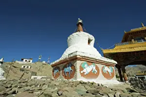 Tibetan Prints: India, Ladakh, Leh, small white stupa at the entrance of the city
