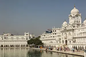 India, Punjab, Amritsar. Sikh pilgrims near entrance to the Golden Temple