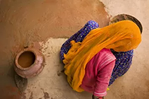 Images Dated 1st November 2006: India, Rajasthan. Woman painting. Credit as: Jim Nilsen / Jaynes Gallery / DanitaDelimont