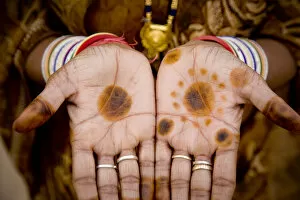 India, Rajasthan. Womans hands with henna coloring