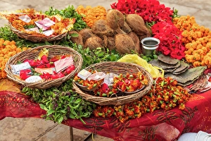 South Asia Prints: India, Uttar Pradesh, Varanasi, Bangali Tola. Flowers, coconuts, and other offerings