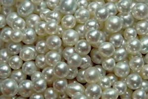 Indonesia, Papua, Raja Ampat. Bowl of pearls cultured from silver-lipped pearl oysters