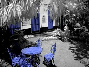 Outdoor Cafe Prints: Infra red image with blue chairs in Guanabacoa area of Havana Cuba of the Santeria