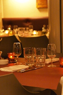 Images Dated 24th February 2005: Interior of The restaurant Brunel at night. Tables with glasses, knives, ofrks, glasses