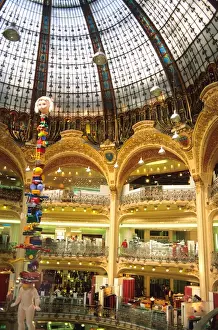 Language Prints: Interior view of department store Galleries Lafayette in Paris, France