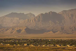 Prints of Iran, Southeastern Iran, Mahan, mountains and elevated town view Images Dated 2018 June: Iran, Southeastern Iran, Mahan, mountains and elevated town view