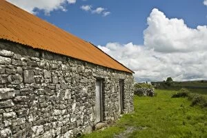 Ireland, the Burren. Traditional stone barn in the countryside