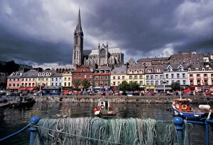 Ireland, County Cork, Cobh. Harbor view and St. Colman's church