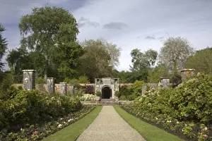 Images Dated 25th May 2009: Ireland, the Dromoland Castle Walled Garden path through a brick archway and Leamaneh